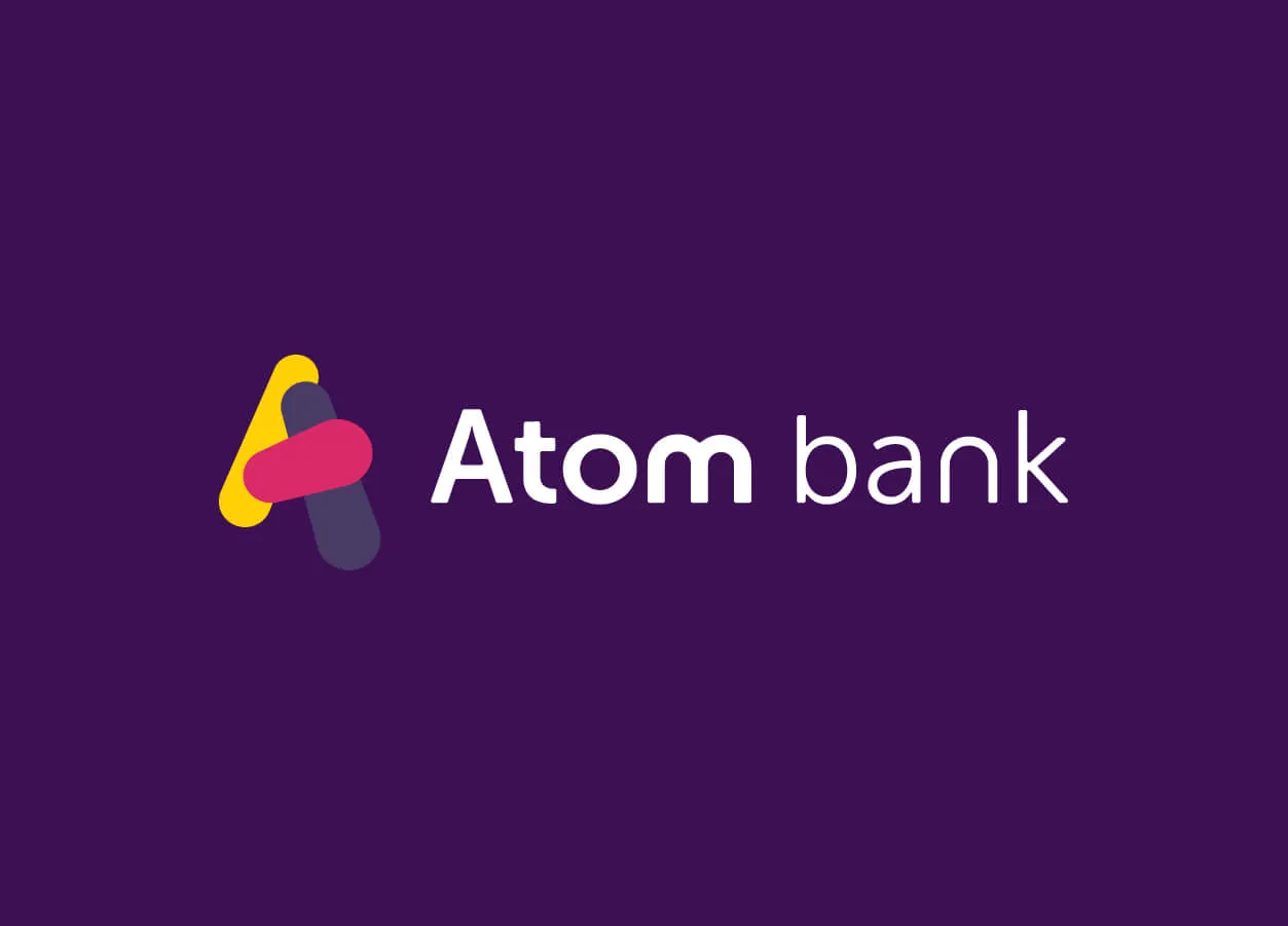 White atom logo on a purple background