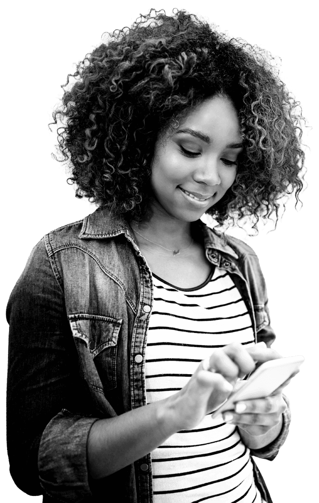 Young woman, in a stripey top, happily contacting Atom bank on her phone