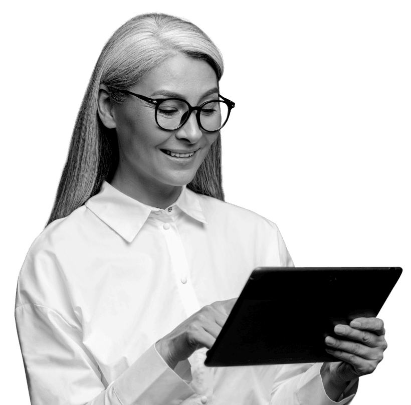 Woman with glasses on ipad