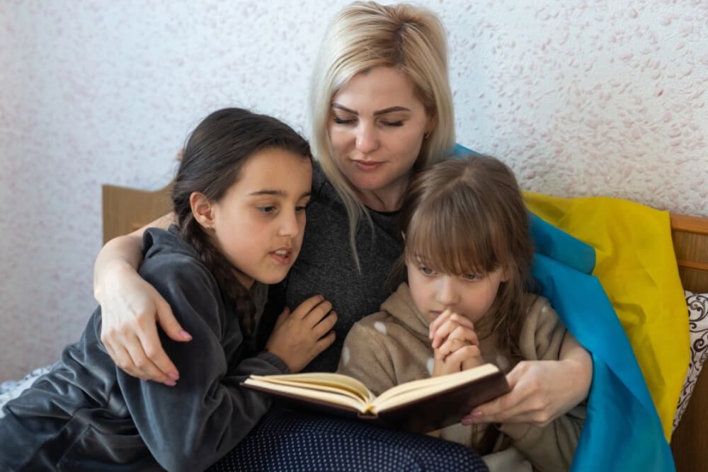 Mother and children reading