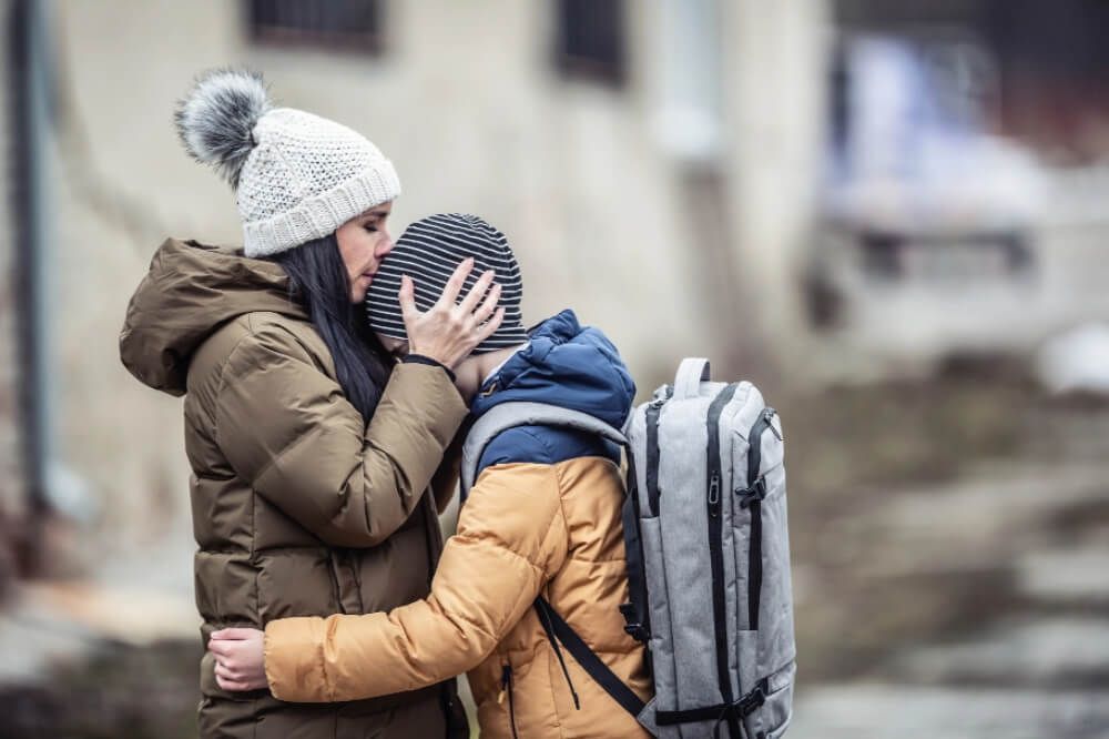 Mother and child hugging