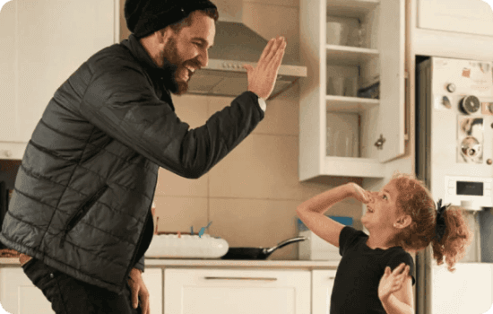 Father and daughter excited about their Atom bank remortgage