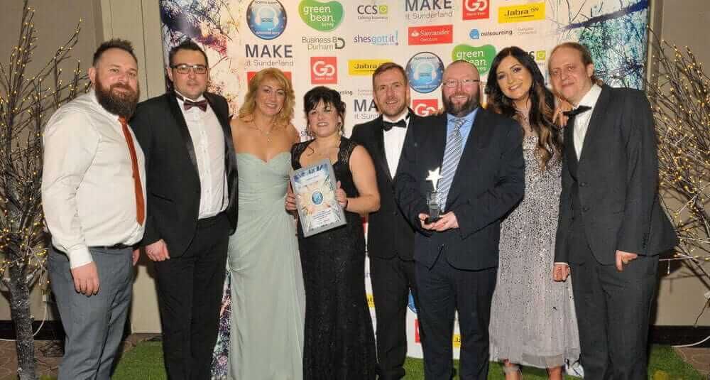 The Atom bank Contact Centre team at an award ceremony with the prize