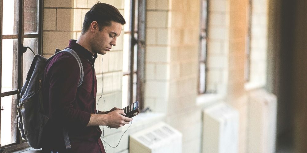 Student looking at their wallet