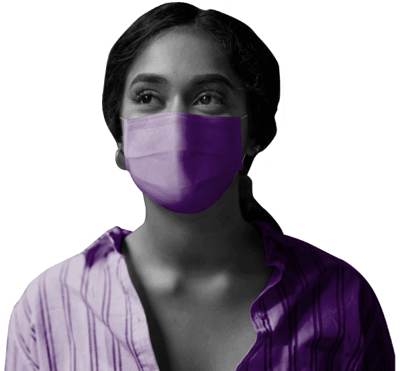 Young woman working at Atom wearing a purple face mask