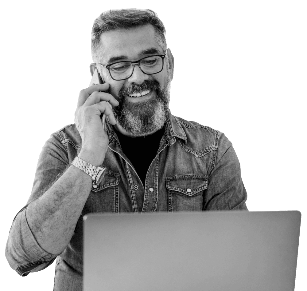 Man in denim shirt on laptop