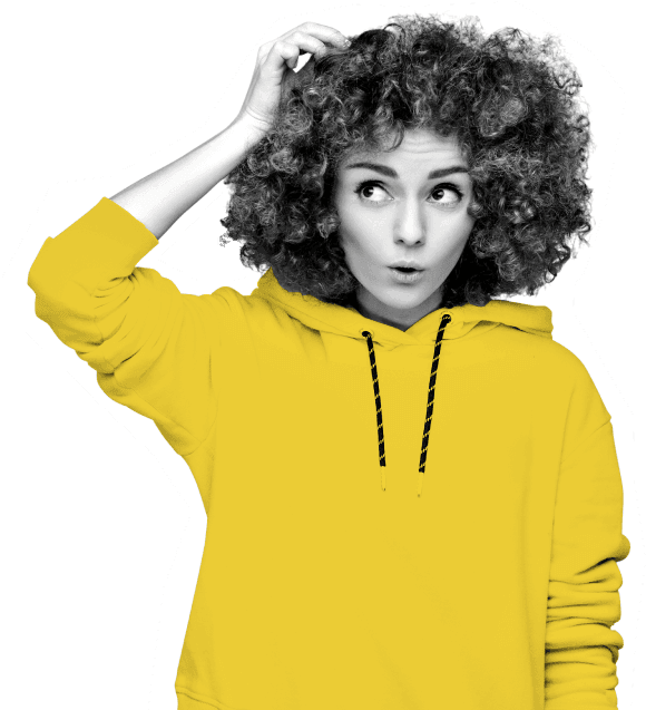 Young woman, wearing a yellow hoodie, looking excitedly at the Atom blog